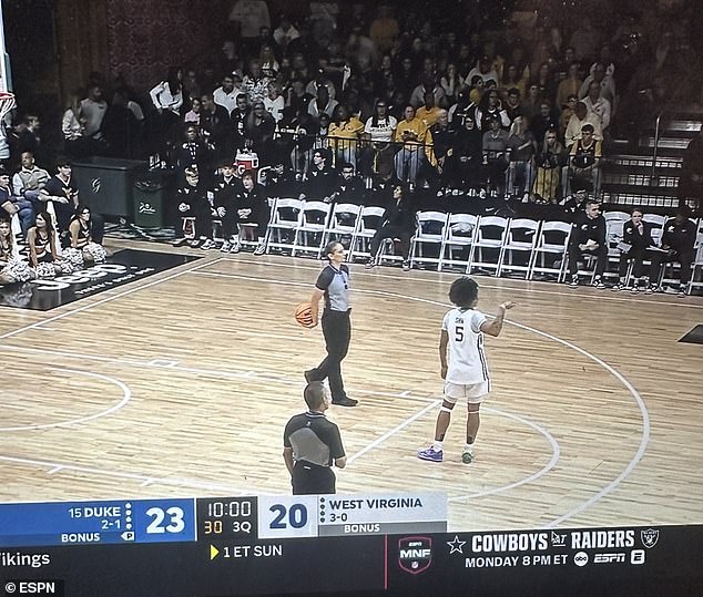 103904027-15293483-West_Virginia_s_entire_bench_was_ejected_when_a_skirmish_broke_o-a-107_1763184175243.jpg