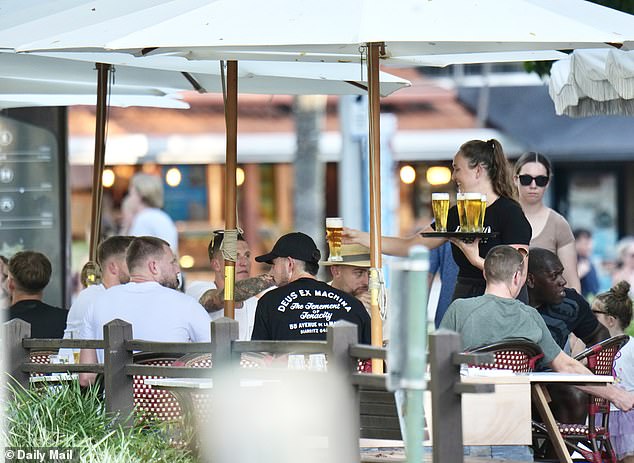 104934523-15404439-Pictured_England_stars_enjoying_some_cold_beers_during_their_bea-a-23_1766399704885.jpg