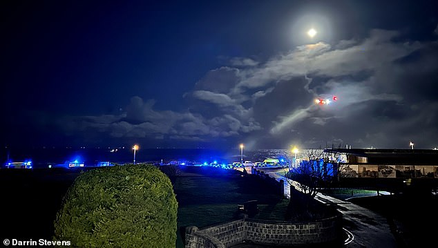 105187989-15433153-Eyewitnesses_reported_seeing_flashing_blue_lights_across_the_pro-a-22_1767534577182.jpg