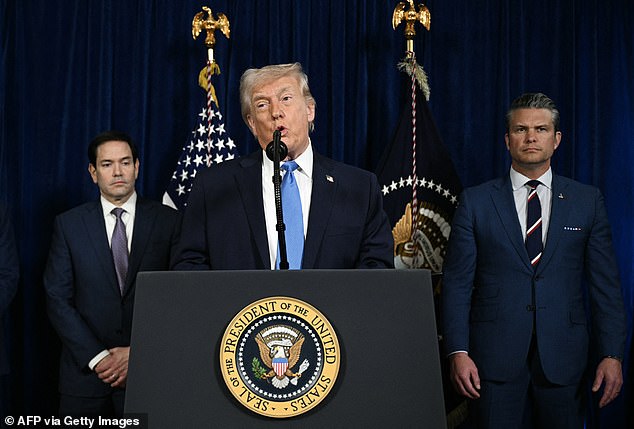 105203345-15431549-US_President_Donald_Trump_alongside_Secretary_of_State_Marco_Rub-a-2_1767465591658.jpg