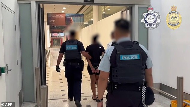 105819349-15496993-The_woman_was_arrested_at_Sydney_airport_after_her_luggage_was_i-a-1_1769381630912.jpg