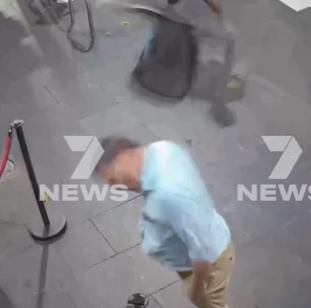 106001629-15516451-The_man_was_hit_by_a_chair_that_was_flung_from_his_friend_after_-m-8_1769903091443.jpg