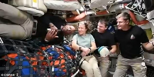 107785949-15720973-The_four_NASA_astronauts_making_their_way_as_a_part_of_the_histo-a-23_1775798012805.jpg