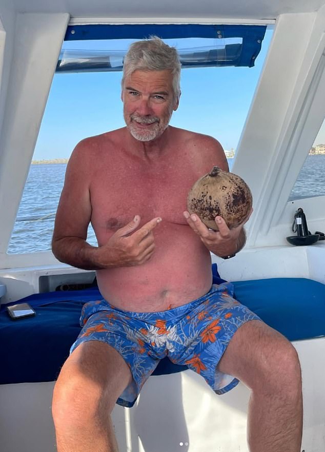107818827-15724577-Brian_Hooker_was_seen_wandering_around_a_Bahamas_boat_yard_just_-a-22_1775929000255.jpg
