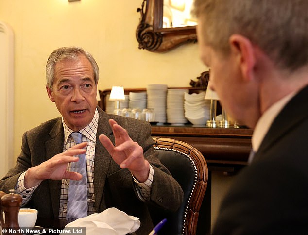 108115191-15760631-Nigel_Farage_is_interviewed_by_the_Daily_Mail_s_Jason_Groves_at_-m-26_1776992540585.jpg