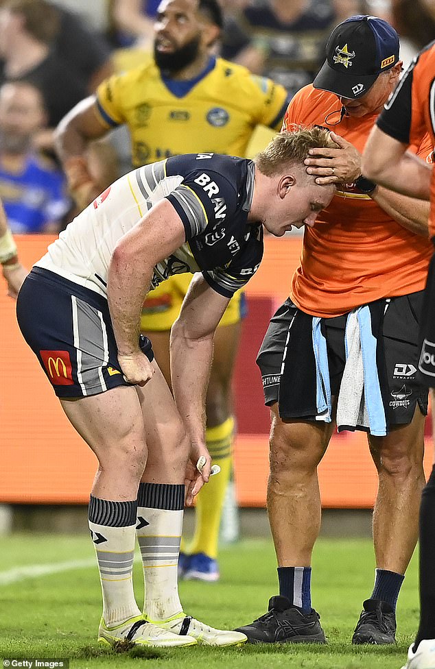 108482321-15802889-Queensland_star_Tom_Dearden_looks_in_serious_doubt_for_the_Origi-a-1_1778277840113.jpg
