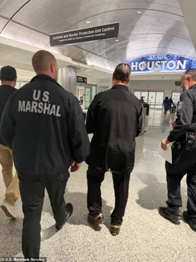 108565857-15811003-Pictured_U_S_Marshals_and_police_escort_Werstine_in_Houston_He_w-a-7_1778635983710.jpg