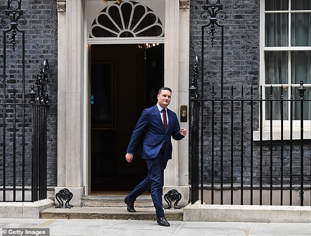 108571105-15813807-A_grim_faced_Health_Secretary_walked_out_of_Downing_Street_again-a-29_1778666865413.jpg