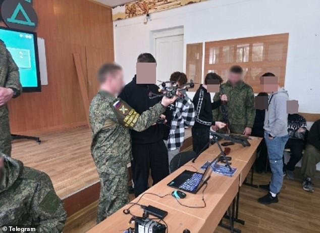 108690709-15827487-Vladimir_Putin_is_recruiting_Ukrainian_children_to_build_a_drone-m-108_1779109855089.jpg