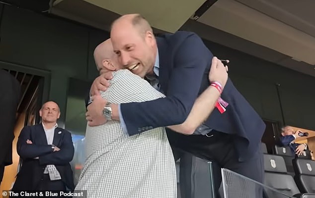 108789207-15839079-Prince_William_enthusiastically_hugged_a_fellow_Villa_fan_after_-m-28_1779402582804.jpg