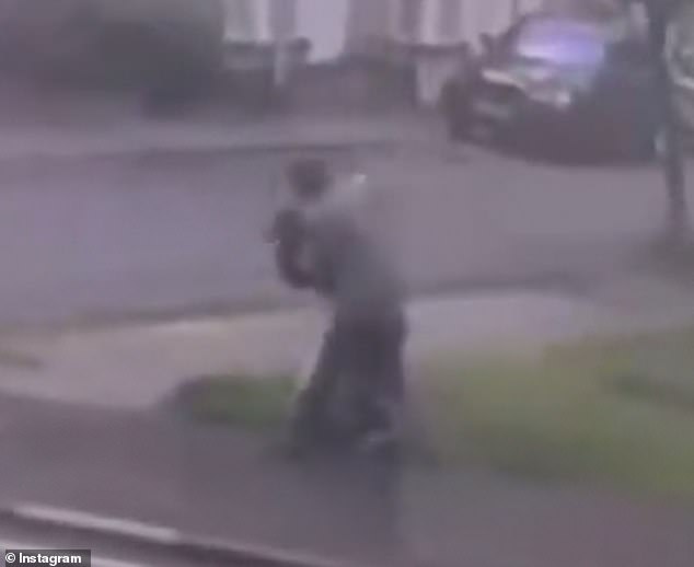 109324957-15898805-Footage_of_the_incident_shows_a_woman_walking_along_a_street_whe-a-1_1781440661115.jpg