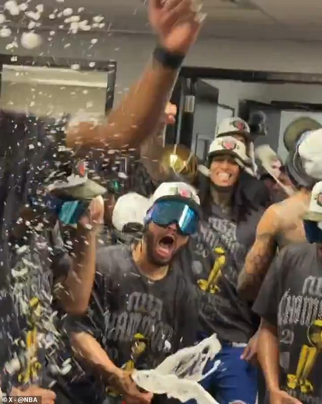 109342813-15898513-Finals_MVP_Jalen_Brunson_sprayed_champagne_over_his_teammates_as-a-8_1781444015019.jpg