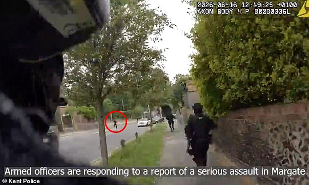 109604617-15930483-Three_armed_police_officers_are_pictured_pursuing_a_suspect_circ-a-1_1782462233670.jpg