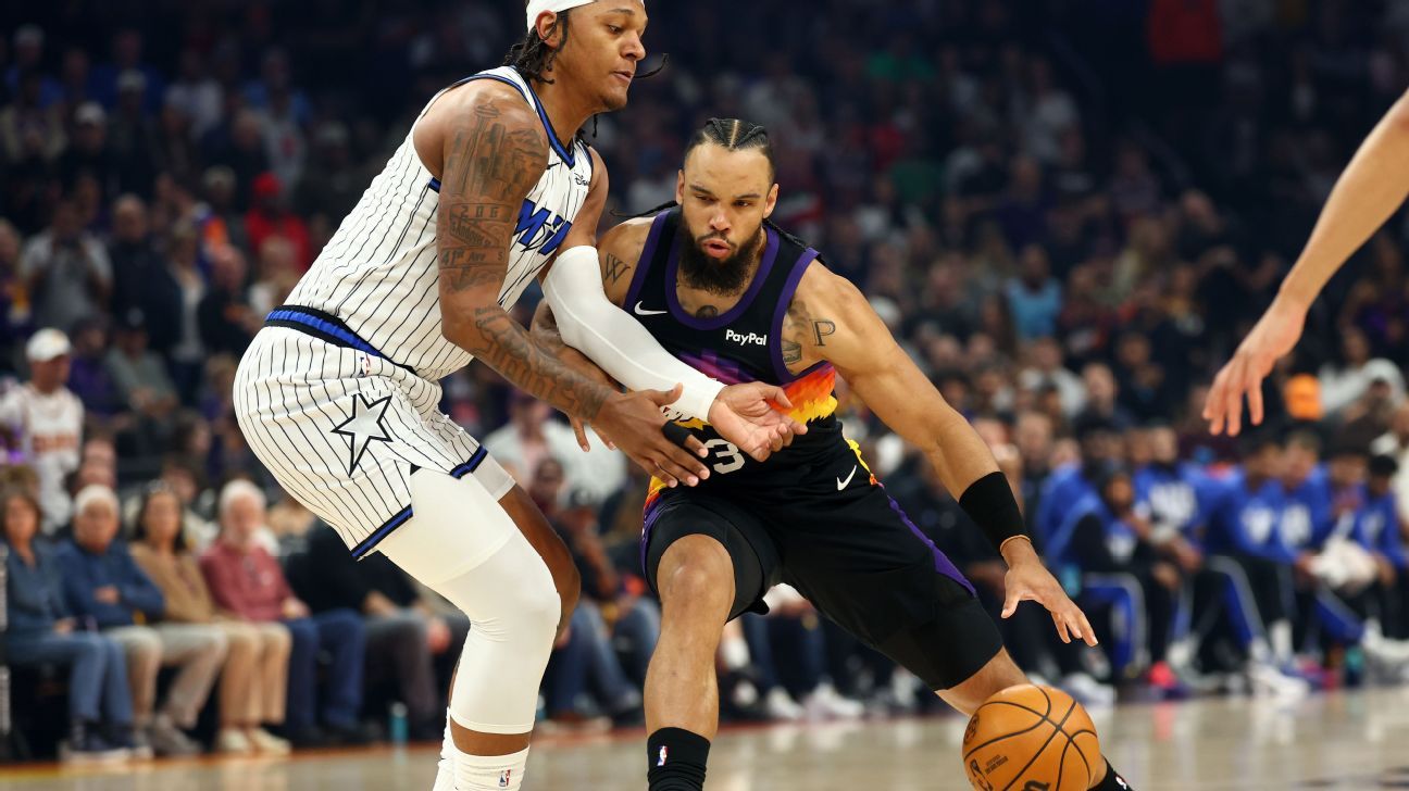 Las fuentes dicen que Brooks de los Suns se rompió la mano; Booker estará fuera por una semana.