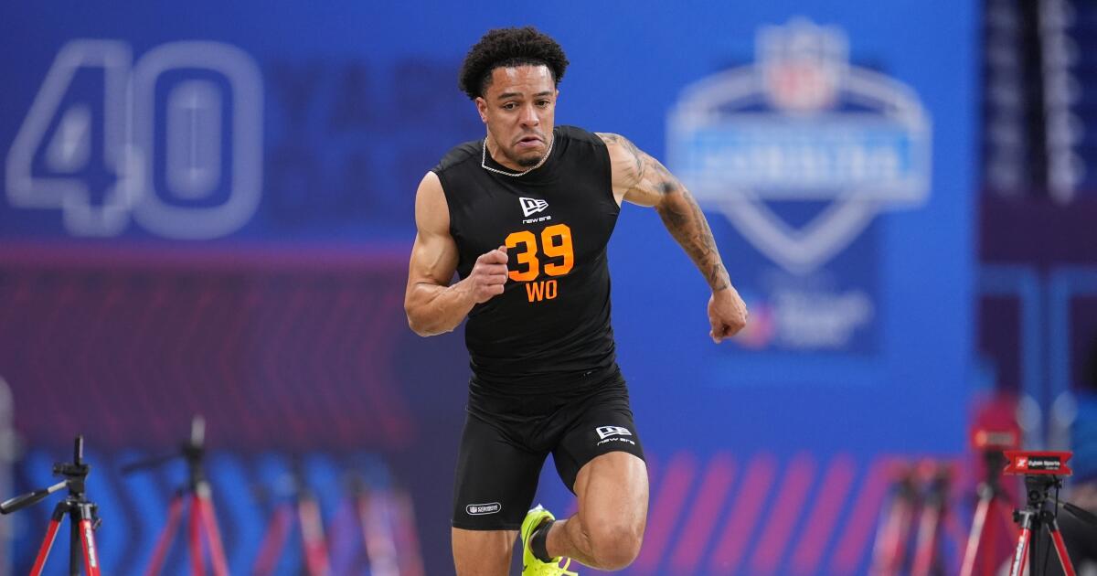 1777160853_urlhttps3A2F2Fcalifornia-times-brightspot.s3.amazonaws.com2Fe52F922F8eee39d849fb827bb42184a504fa2Fnfl-combine-football-16702.jpg