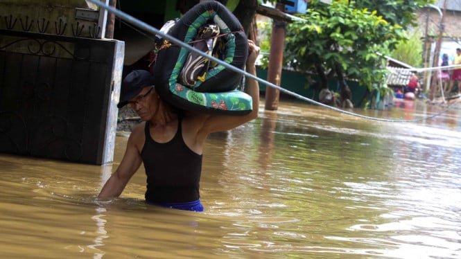 6020cfb0a9394-banjir-jakarta_665_374.jpg