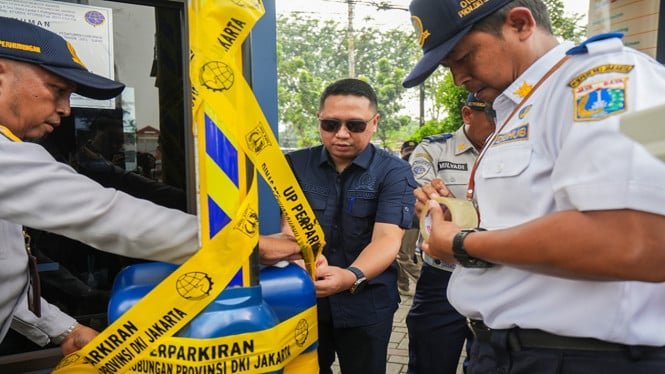 68cbf93b3bd11-penyegelan-parkir-ilegal_665_374.jpg