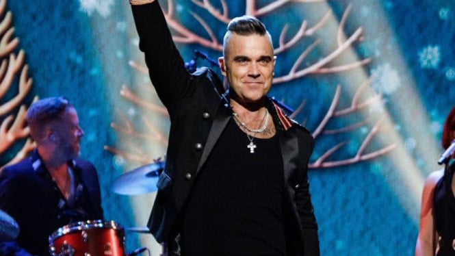 5e0a5418c150f-penyanyi-pop-asal-inggris-robbie-williams_665_374.jpg