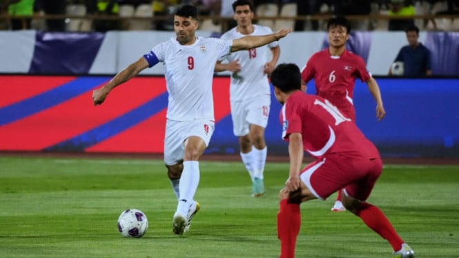 6848e9cf38858-penyerang-timnas-iran-mehdi-taremi_665_374.jpg
