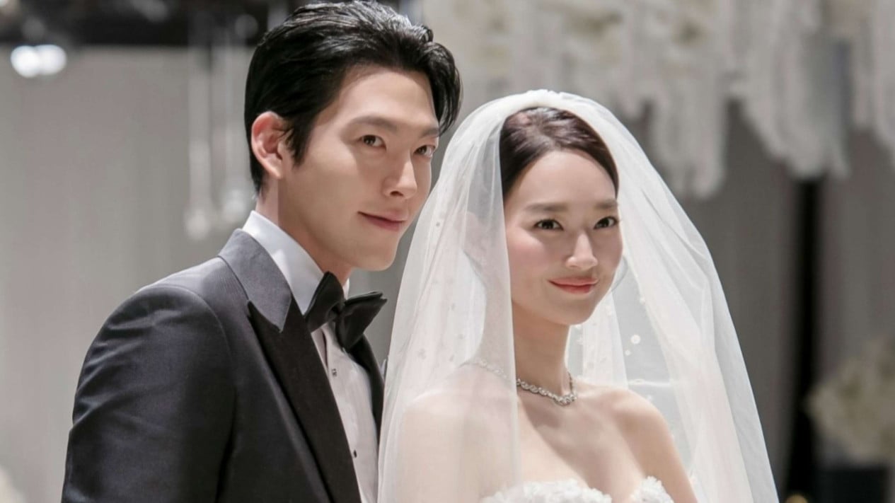 6948b9f2d958c-pernikahan-kim-woo-bin-dan-shin-min-ah_1265_711.jpg