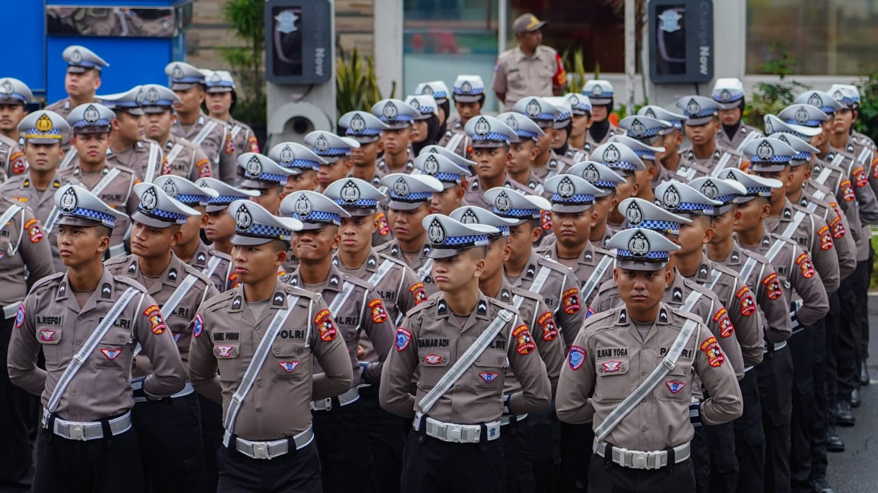 69d9114e6b0c1-anggota-polisi-lalu-lintas-polantas_gemini_1265_711.jpg