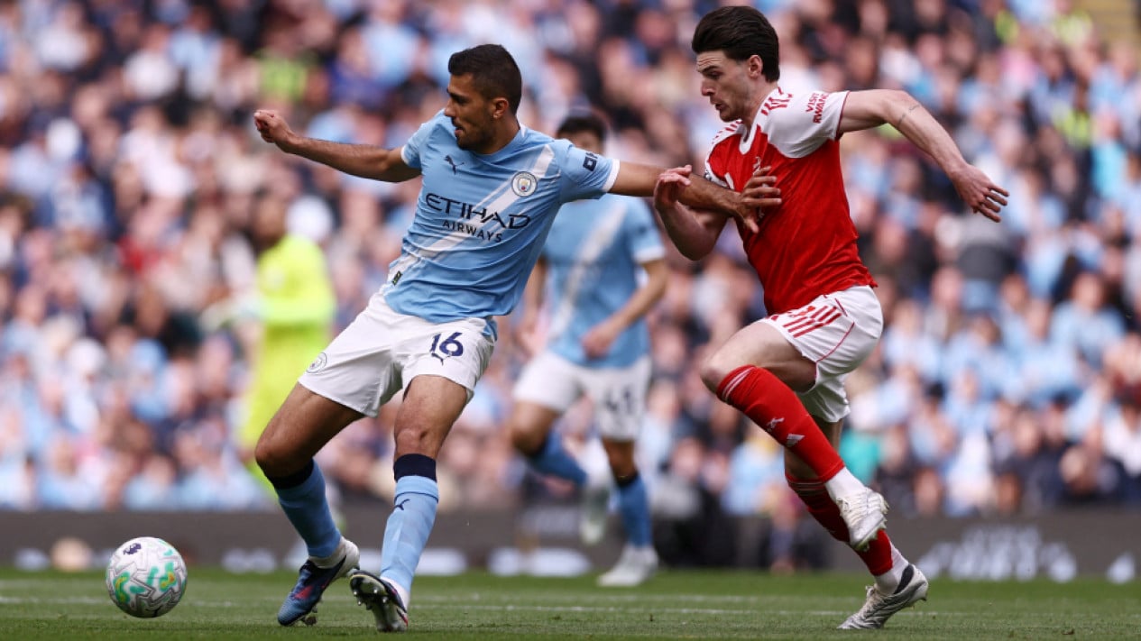 6a03a7df48f54-pemain-manchester-city-rodri-kiri_gemini_1265_711.jpg