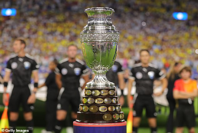 87341837-15326945-The_Copa_America_trophy_is_displayed_prior_to_the_final_match_of-a-39_1764127600648.jpg