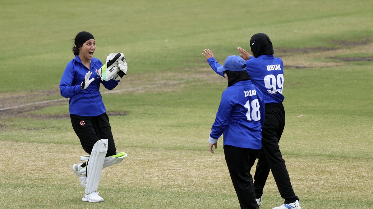 AFP__20250130__36WN2J7__v1__HighRes__CricketAusAfgRefugeeWomen.jpg