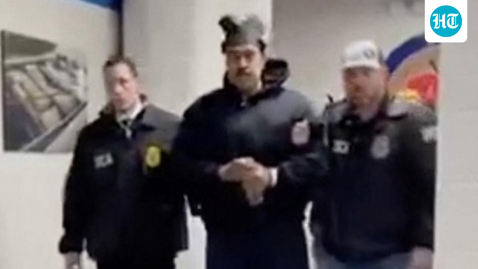 Nicolas-Maduro-is-perp-walked-by-DEA-agents-inside_1767522384122_1767522399487.jpg