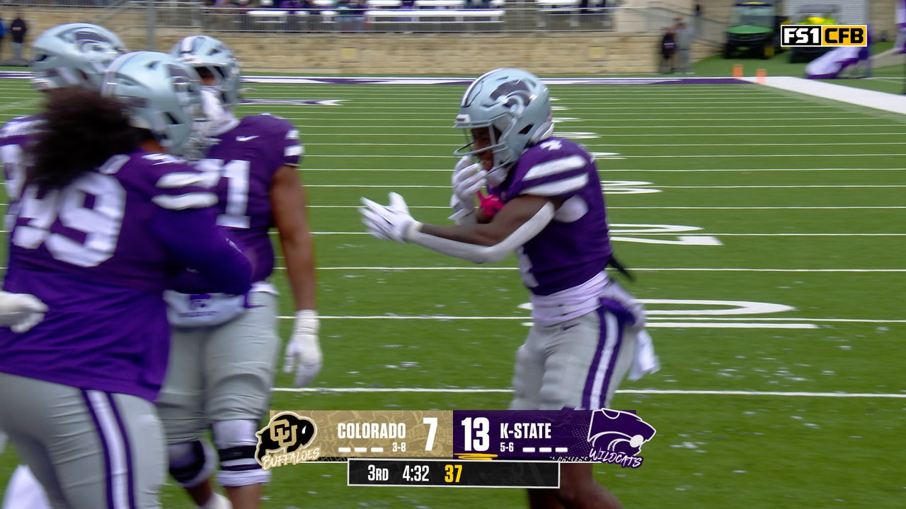 Joe Jackson corre hacia la izquierda para un touchdown de 1 yarda, dándole a Kansas State la ventaja sobre Colorado